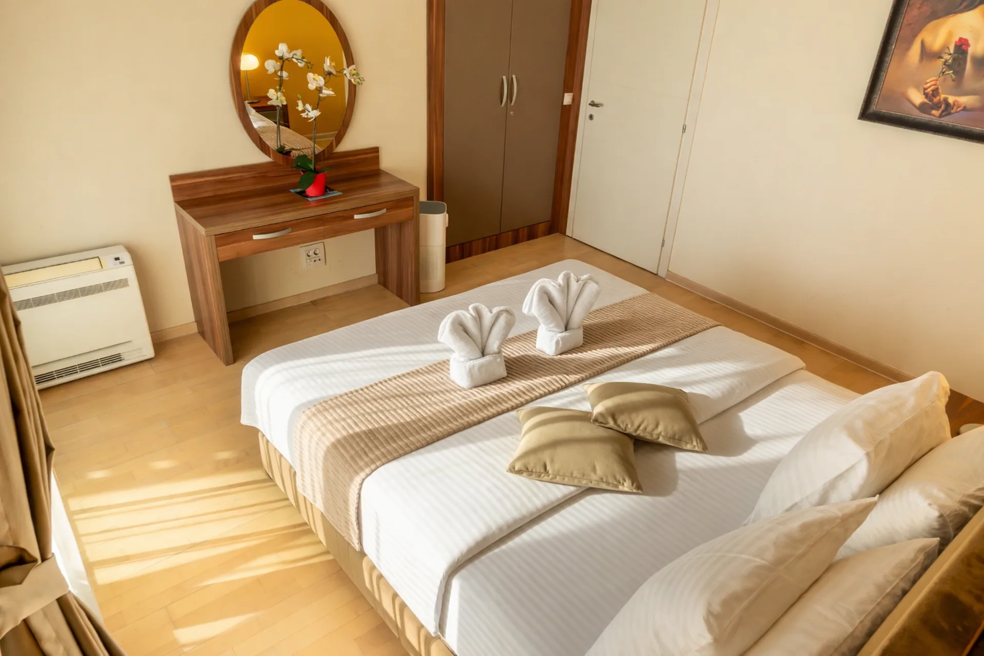 King bedroom with terrace window, one-bedroom suite at Capitol Suites, Skopje