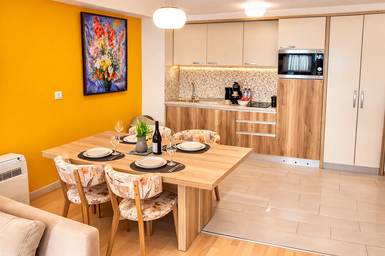 Fully equipped kitchen with dining table, one-bedroom suite at Capitol Suites, Skopje